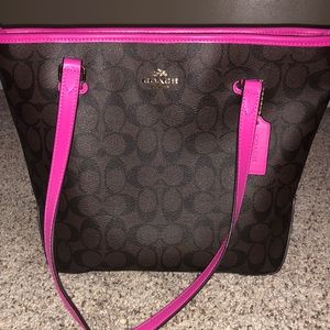 Dark brown and neon pink coach purse